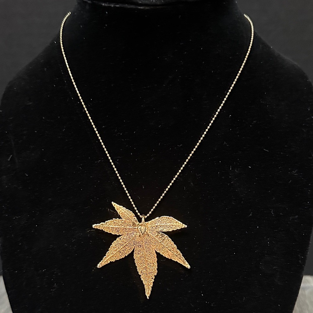 Elegant Gold Leaf Pendant Necklace with 925 under gold ball chain.